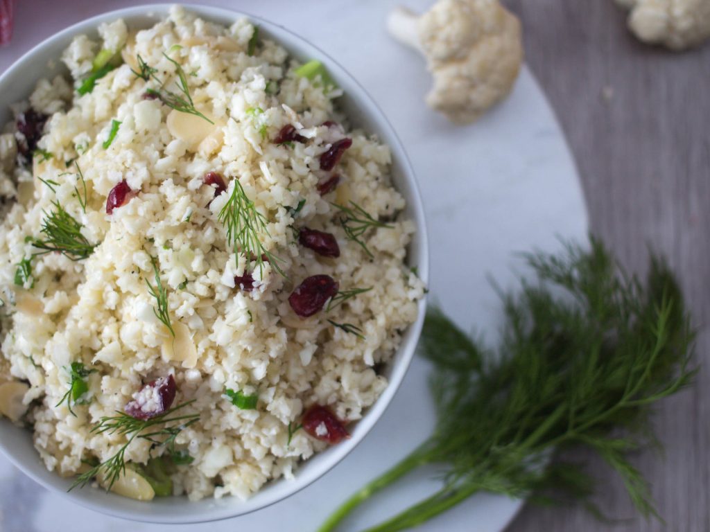 Cauliflower rice with cranberries, almonds and dill recipe